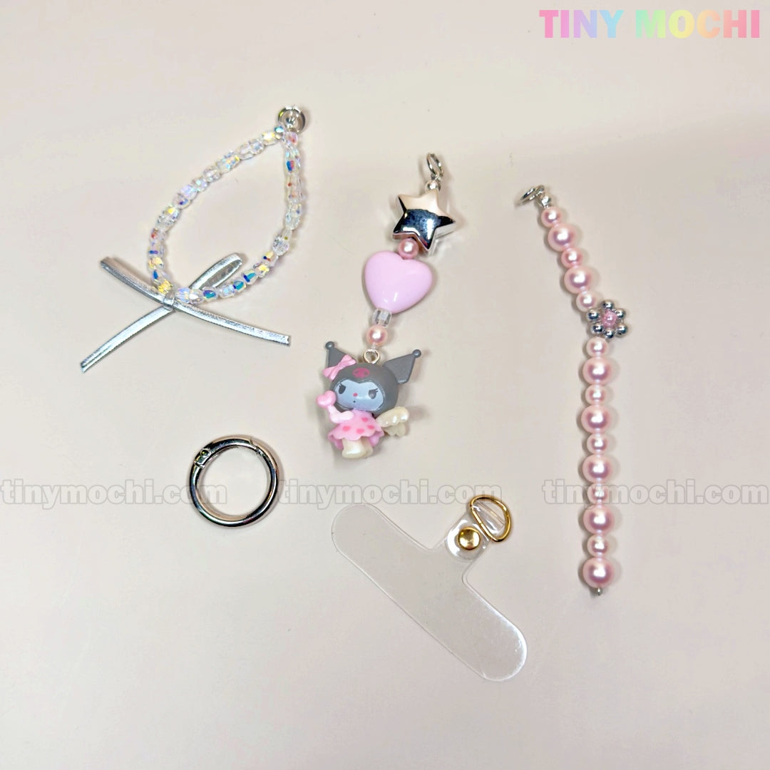 The Kawaii Angel Charm Keychain Kit by Tiny Mochi includes pearl, ribbon, and star accessories to create cute DIY keyrings for your phone or bag. Tiny Mochi is displayed at the top right for a perfect pastel touch.