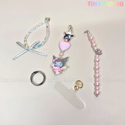 The Kawaii Angel Charm Keychain Kit by Tiny Mochi includes pearl, ribbon, and star accessories to create cute DIY keyrings for your phone or bag. Tiny Mochi is displayed at the top right for a perfect pastel touch.