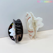 The Tiny Mochi Kawaii Bunny Hair Claw Clips feature adorable donut sprinkle and croissant designs in cute acrylic, making them perfect hair accessories for fans of playful styles. Both are displayed side by side against a plain background.