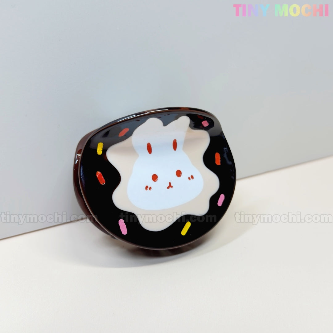 Show off your sweet style with the Tiny Mochi Kawaii Bunny Hair Claw Clip—choose from donut sprinkle or croissant designs! This cute acrylic hair accessory is perfect for fans of playful, pastel bunny looks.