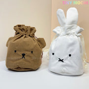 Two Kawaii Bunny & Bear Drawstring Pouches by My Store are shown: one brown with a bear face and ears, the other white with a bunny face and long ears. TINY MOCHI appears in pastel colors at the top right.