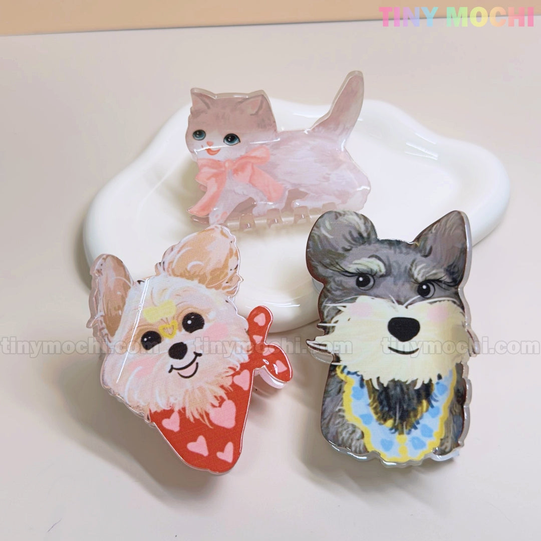Add adorable flair to your hair with Tiny Mochis Kawaii Dog & Cat Hair Claw Clips—cute cartoon puppy and kitten accessories perfect for pet lovers. The Tiny Mochi logo is displayed at the top right.