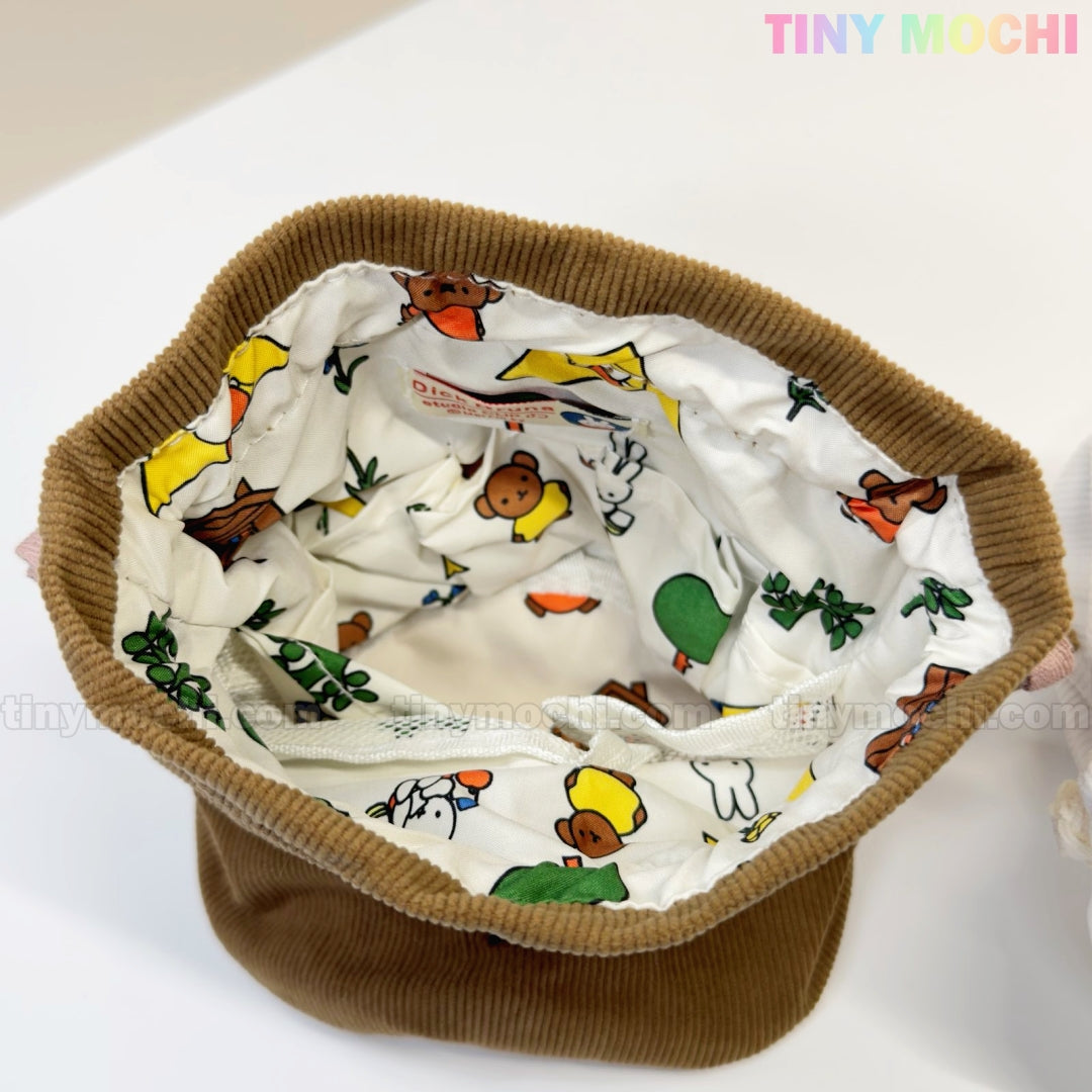 The Kawaii Bunny & Bear Drawstring Pouch by My Store is an open corduroy bag with a white fabric lining featuring colorful cartoon animals—perfect as a cute coin or makeup bag for your essentials.