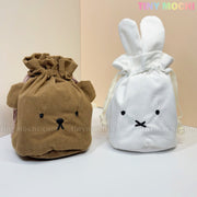 The Kawaii Bunny & Bear Drawstring Pouch by My Store is a soft corduroy coin and makeup bag with stitched bunny and bear faces, ideal for storing essentials. Features an easy drawstring closure.
