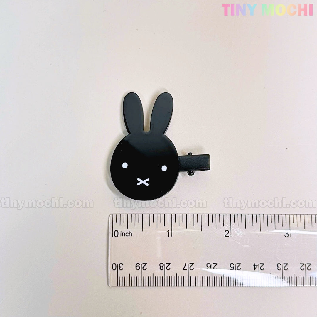 A Kawaii Bunny hair clip from Tiny Mochi’s Cute Cartoon Animal Hair Clips for Girls is shown next to a clear ruler on a white surface. “tiny mochi” appears in pastel colors in the top right corner.