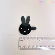 A Kawaii Bunny hair clip from Tiny Mochi’s Cute Cartoon Animal Hair Clips for Girls is shown next to a clear ruler on a white surface. “tiny mochi” appears in pastel colors in the top right corner.