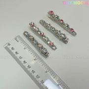 Four silver Kawaii Gem Hair Clips for Girls by Tiny Mochi, featuring star and heart designs with blue and pink gems, are displayed beside a transparent ruler on a light surface. Perfect sparkly Y2K pins for Coquette Aesthetic lovers.