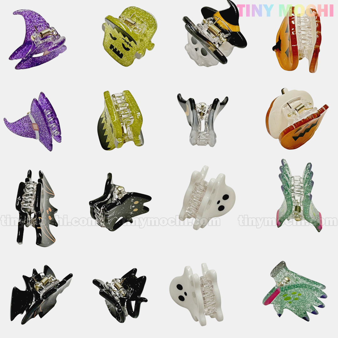The Kawaii Halloween Hair Claw Clips – Set of 8 Spooky-Cute Designs by Tiny Mochi Gift Shop Houston are arranged in rows on a white background, with the Tiny Mochi logo partially visible at the top right.