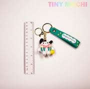 Tiny Mochi’s Cute Kawaii Character Keychains feature a 3D anime-inspired dog with a cupcake, yellow chick, Happy Party tag, and clear 15cm ruler—an adorable gift for bag or key accessorizing! Perfect for fans of unique kawaii collectibles.