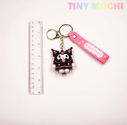 A Cute Kawaii Character Keychain by Tiny Mochi is shown with a clear ruler for scale on a white background. This adorable 3D anime-inspired keychain with strap is perfect for bags, keys, or as a unique gift. TINY MOCHI appears in pastel at the top right.