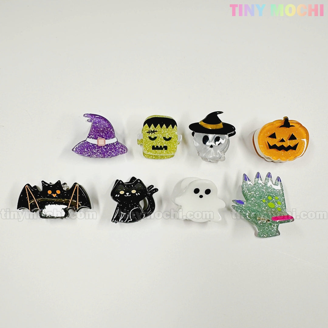 The Kawaii Halloween Hair Claw Clips set from Tiny Mochi Gift Shop Houston includes 8 spooky-cute designs like a witch hat, Frankenstein, jack-o’-lantern, bat, and black cat—perfect for cute Halloween hair accessories or clips.